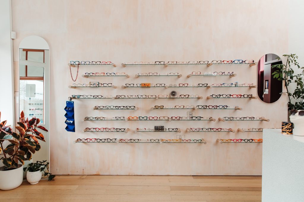 The interior of glasses store Peep with lots of handmade frames on display.